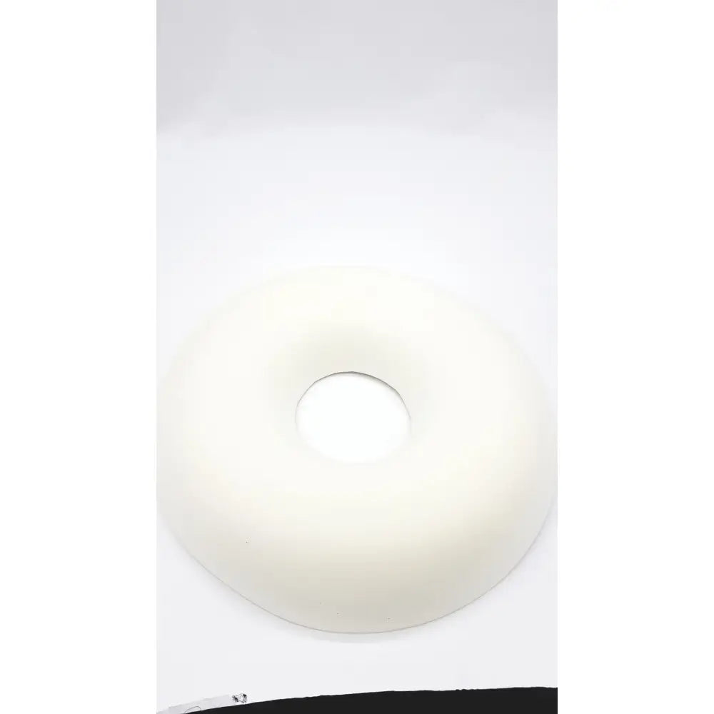 Sammons preston aa3940 ring cushion is a white, smooth, soft donut-shaped cushion designed for comfort and support