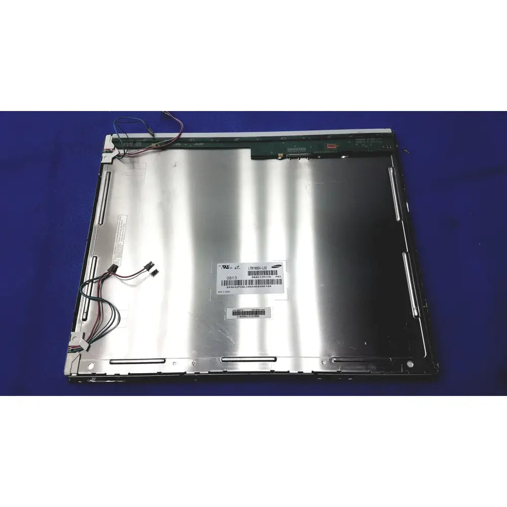 Silver samsung ltm190e4-l02 tft lcd panel screen with visible wiring and barcode label on the back side