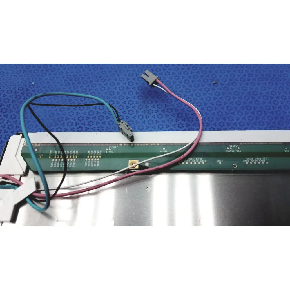 Image of the back side of samsung ltm190e4-l02 tft lcd panel showing green circuit board with wires and connectors