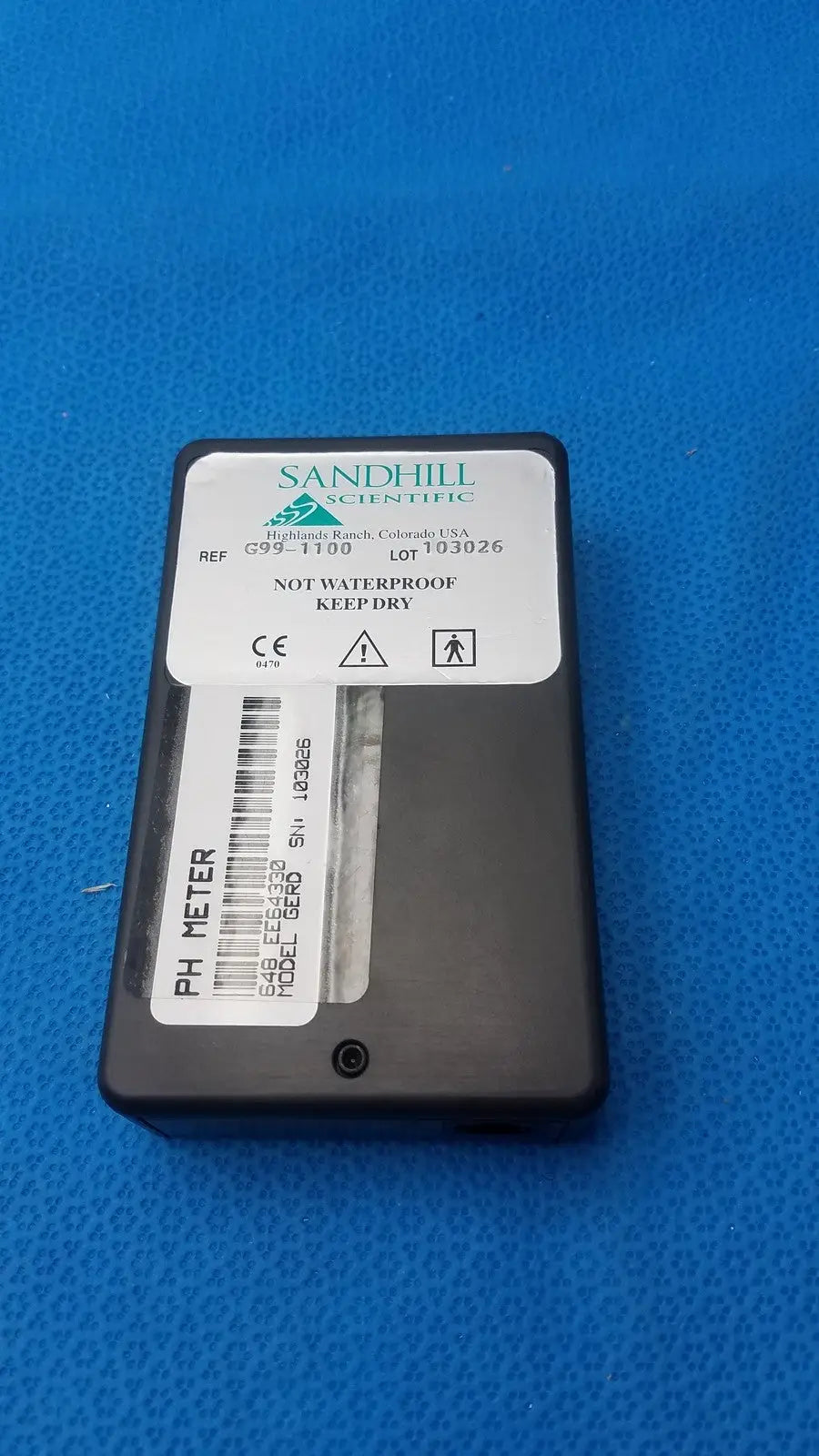 Black sandhill scientific gerd ph recorder g99-1100 with white label showing model number and safety warnings