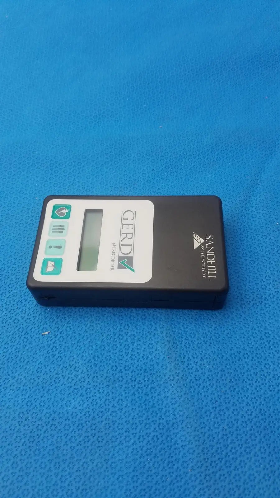 Black rectangular digital ph meter with white display panel green buttons and sandhill brand for sandhill scientific gerd recorder