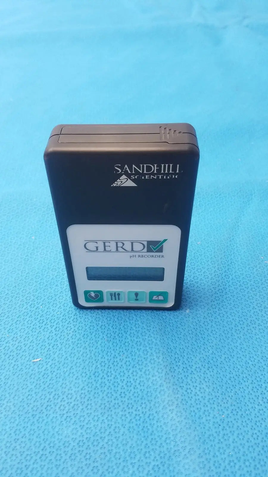 Black Sandhill Scientific Gerd ph recorder G99-1100 with white label teal buttons and display screen for accurate monitoring