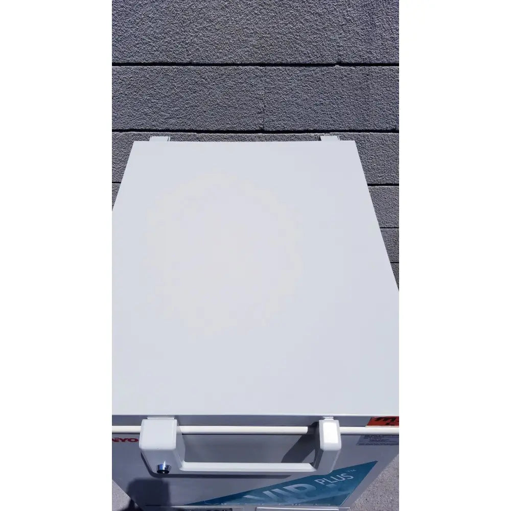 White rectangular freezer with sleek modern design and blue branding from sanyo vip series ultra low temperature freezer model mdf-c8v1