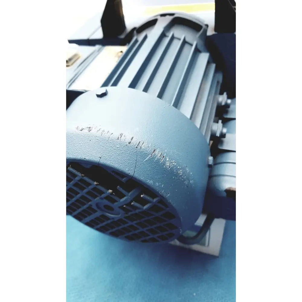 Gray industrial electric motor with ribbed casing and ventilation grille for savant gel pump gp100 use