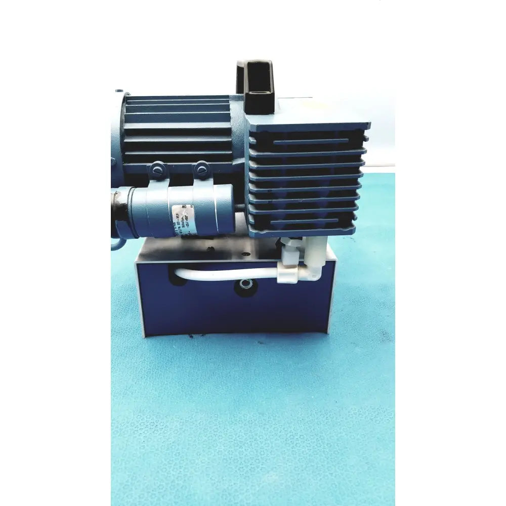 Industrial-grade blue savant gel pump gp100 with ribbed metal casing and white piping for precise gel applications
