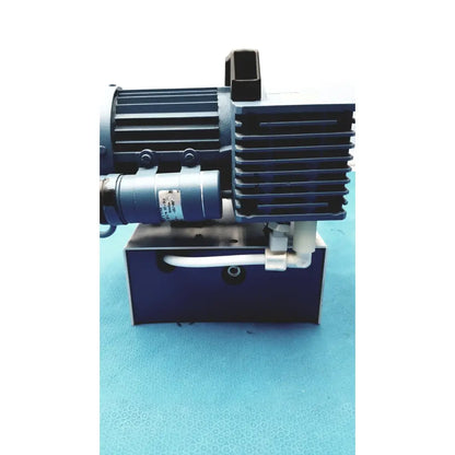 Industrial blue savant gel pump gp100 with ribbed metal casing and white plastic piping for efficient gel pump operation