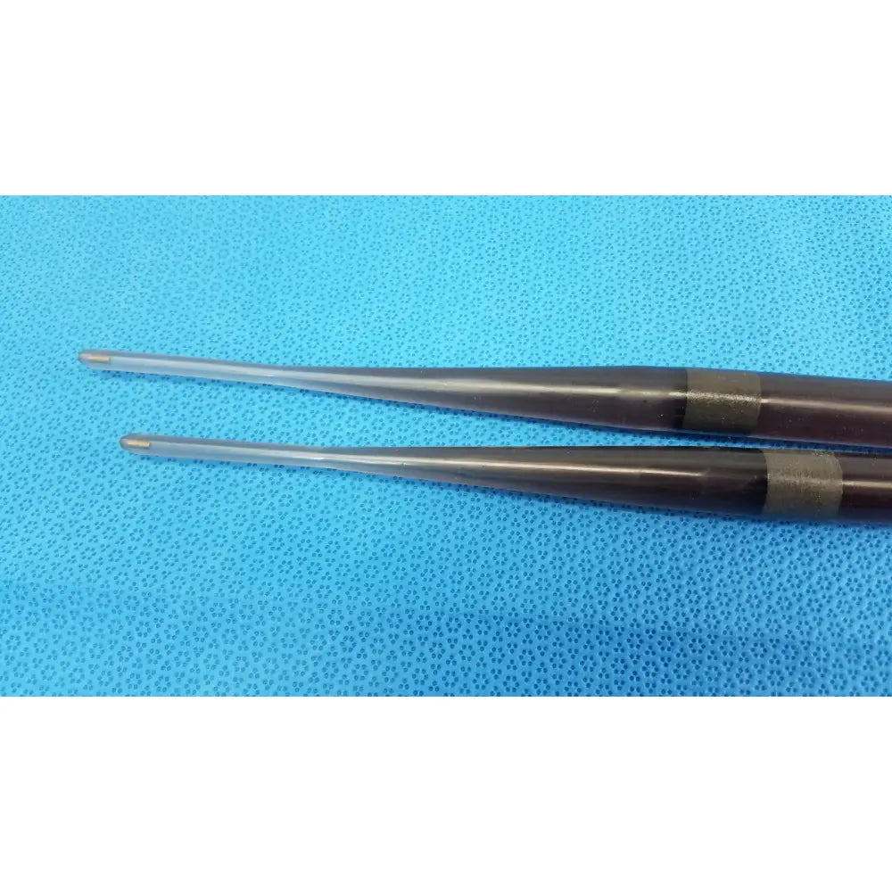 Two dark brown metallic-tipped surgical forceps with textured grip and silver ends for savary gilliard dilator endoscope 19mm