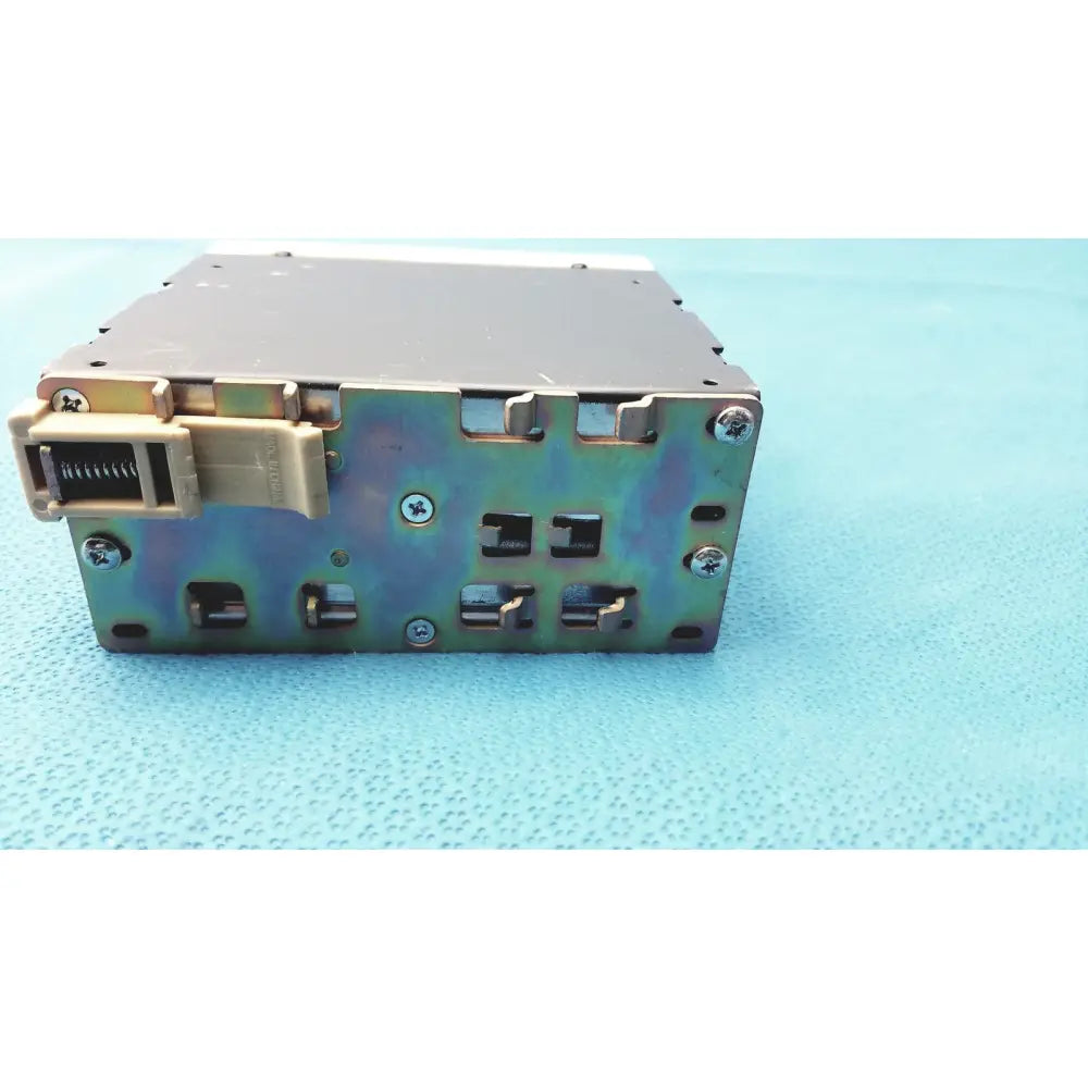 Metallic schneider electric abl7 rp1205 switch mode din rail power supply with beige connector and visible screws backside