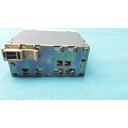 Metallic schneider electric abl7 rp1205 switch mode din rail power supply with beige connector and visible screws backside