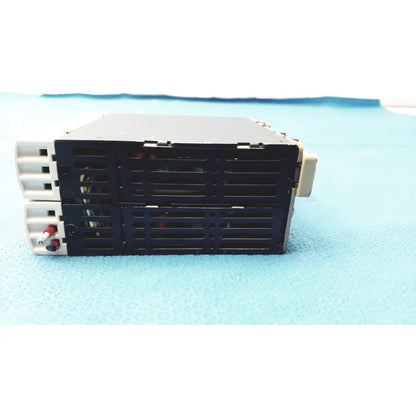 Black and white schneider electric abl7 rp1205 switch mode din rail panel mount power supply with vented front panel and wiring