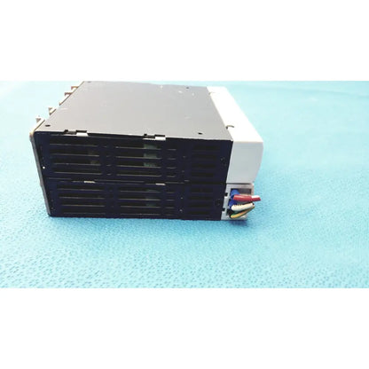 Black and white schneider electric abl7 rp1205 switch mode power supply with colored wires for industrial use