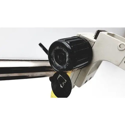 Black textured knob on white plastic handle of Scienscope ssz stereo zoom binocular microscope for precise adjustments
