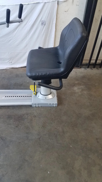 Black padded gym seat with silver metal base and adjustable height on scifit systems rst7000 recumbent stepper