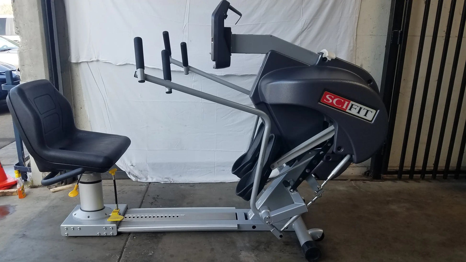Black and silver scifit systems rst7000 recumbent stepper with adjustable seat and handlebars for ergonomic fitness training