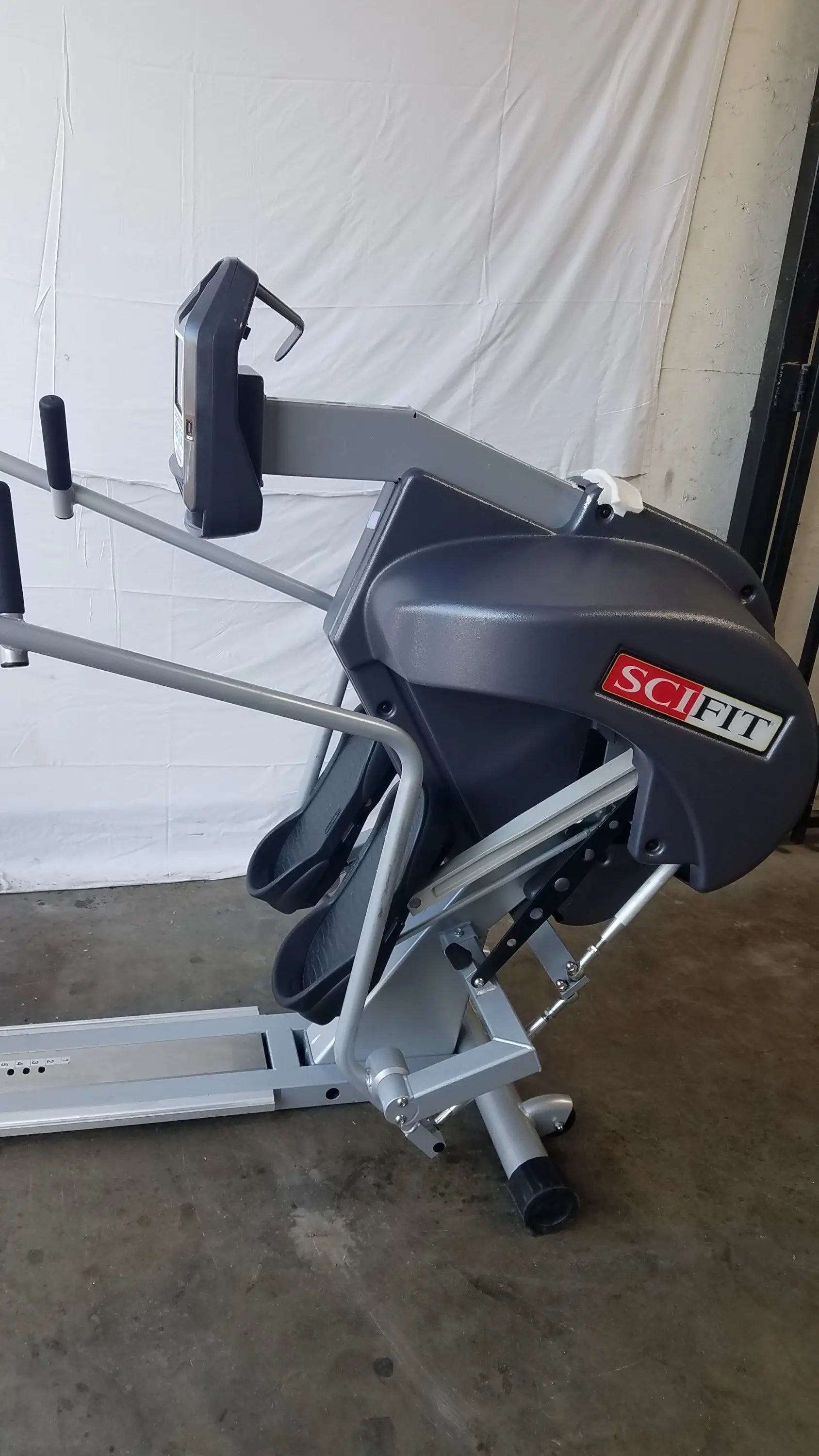 Gray and black scifit systems rst7000 recumbent stepper with sleek modern design for low-impact cardio workouts