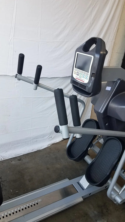 Gray and black elliptical recumbent stepper with digital display screen from scifit systems rst7000 model sn 150-009060