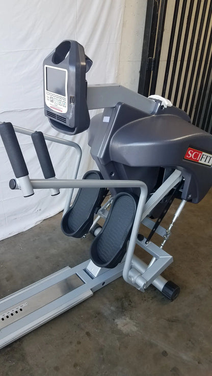 Gray and black Scifit Systems RST7000 recumbent stepper with handlebars-mounted digital display screen for fitness use