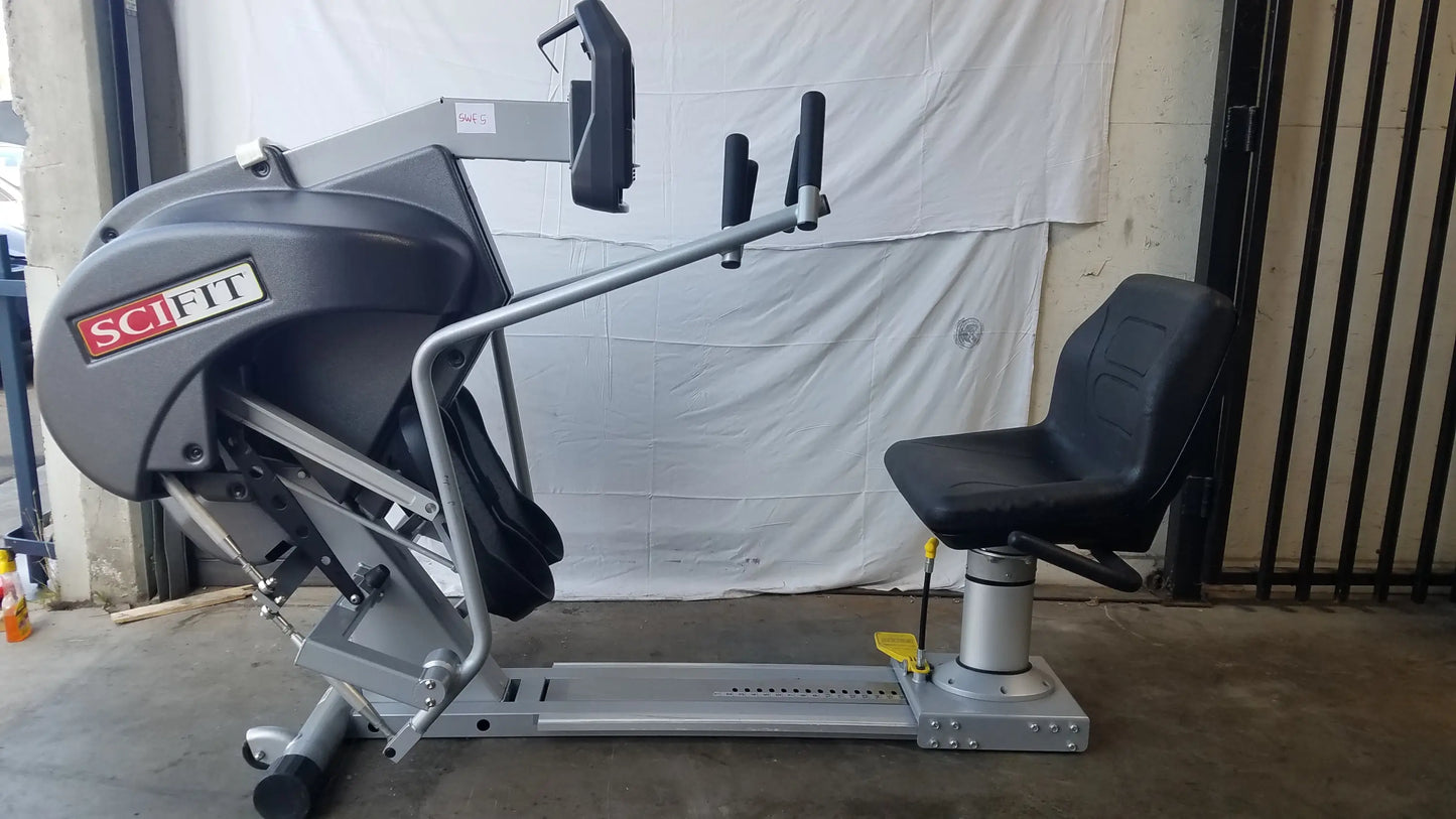 Gray and black scifit systems rst7000 recumbent stepper with padded seat adjustable handlebars and digital display panel