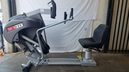 Gray and black scifit systems rst7000 recumbent stepper with padded seat adjustable handlebars and digital display panel