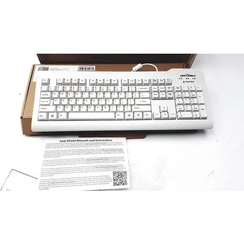 White plastic keyboard with black lettering and usb cable attached from seal shield cleanwipe medical grade series