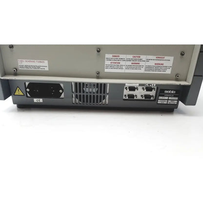 Gray metallic sebia hydraplus 2 autosampler device with multiple ports and warning labels for reuse medical chromatography systems