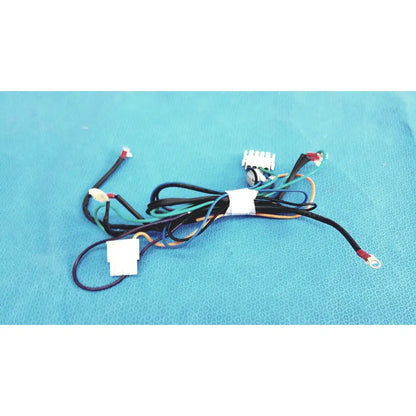 A bundle of multi-colored electrical wires with white plastic connectors and metal terminals for seiwa ferrite cores connectors lead wire harness cable