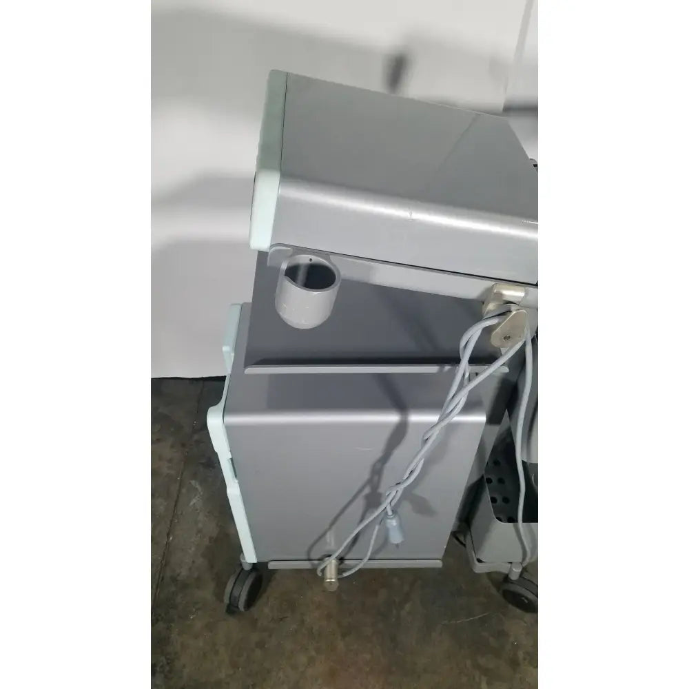 Gray medical cart with sleek metallic finish for senorx cm3000 control module in encor breast biopsy system