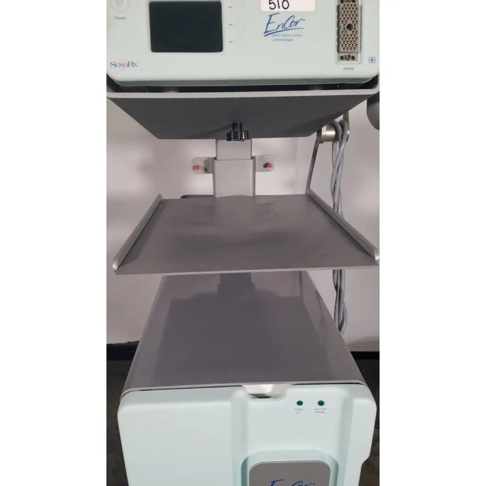 Light gray senorx cm3000 control module with digital display labeled encor for encor breast biopsy vacuum system