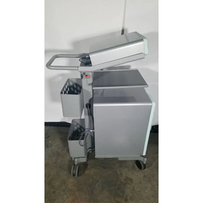 Silver metallic medical cart with multiple compartments and wheels for senoRx cm3000 control module in encor breast biopsy system