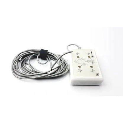White rectangular SensorMedics 3-channel ECG box with gray coiled cable and black strap for cardiac monitoring