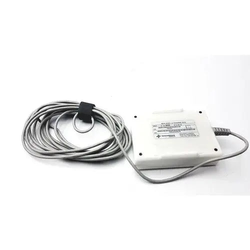 White rectangular power adapter with coiled gray cable for sensormedics 3-channel ecg box p n 7082293