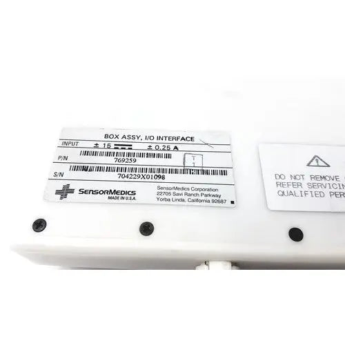White plastic sensor medics 769259 interface box assembly with black printed labels and barcode integrated cable