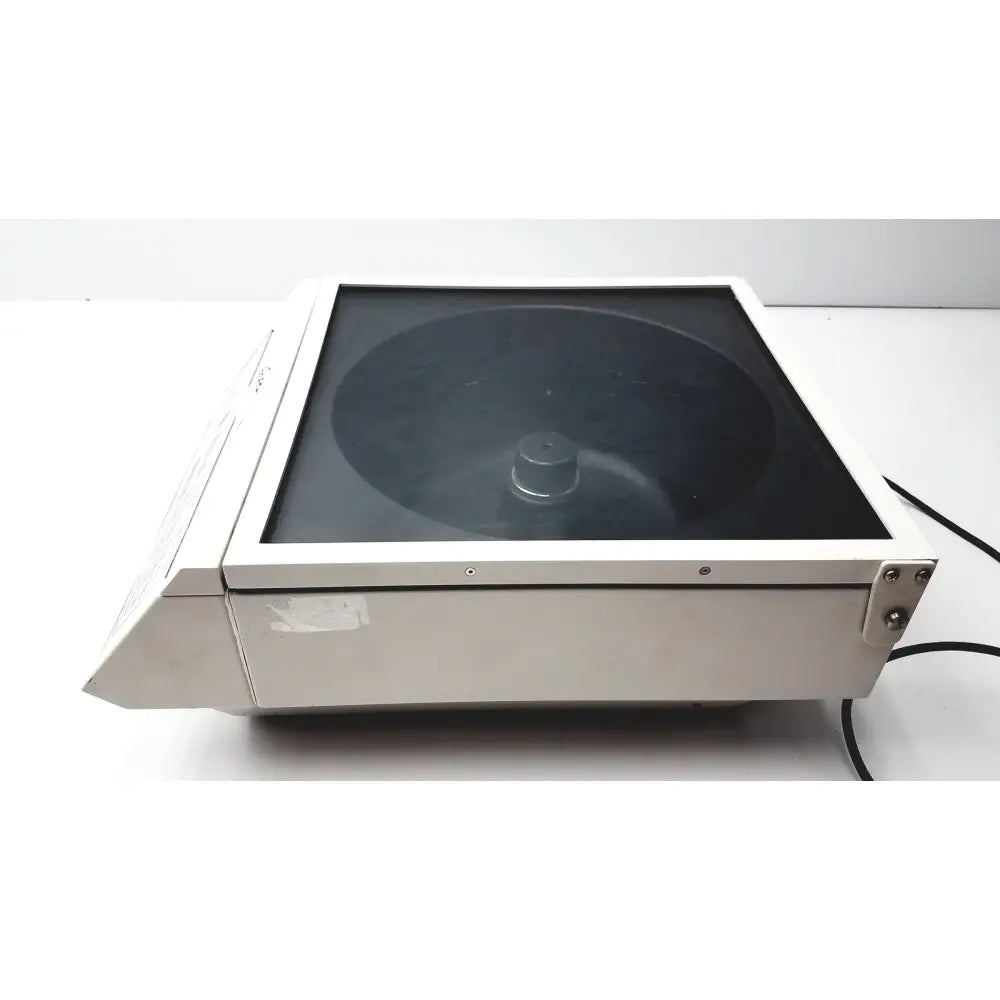 Silver metallic shandon cytospin 3 cytocentrifuge with black glass top and visible rotor chamber for reuse medical labs