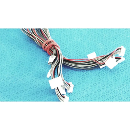 A bundle of multi-colored wires with white connectors and red tie for shinagawa awm 1007 female connectors wire harness
