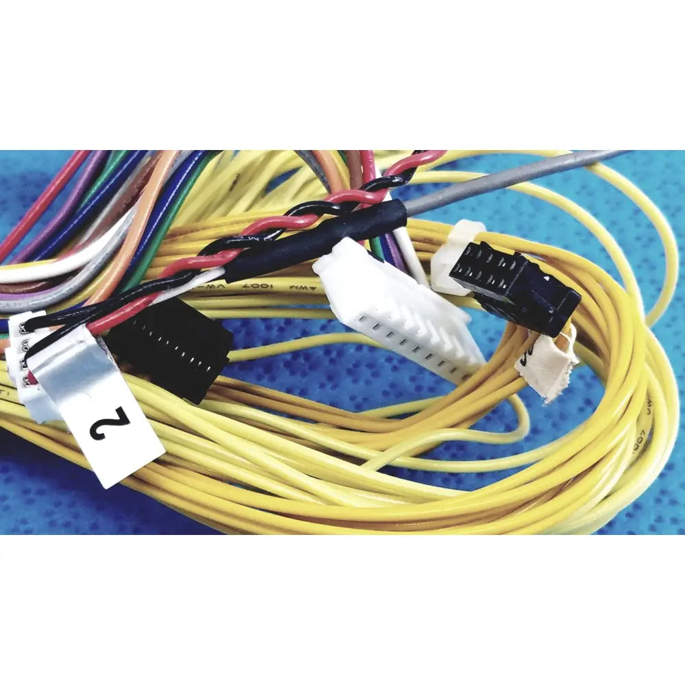 A shinagawa awm 1007 connectors wire harness with yellow red black and white insulated wires and multiple plastic female connectors