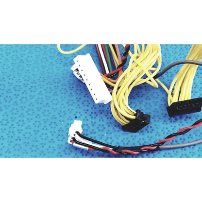 A bundle of yellow black and multi-colored connectors wire harness with white and black female multi-pin connectors shinagawa awm