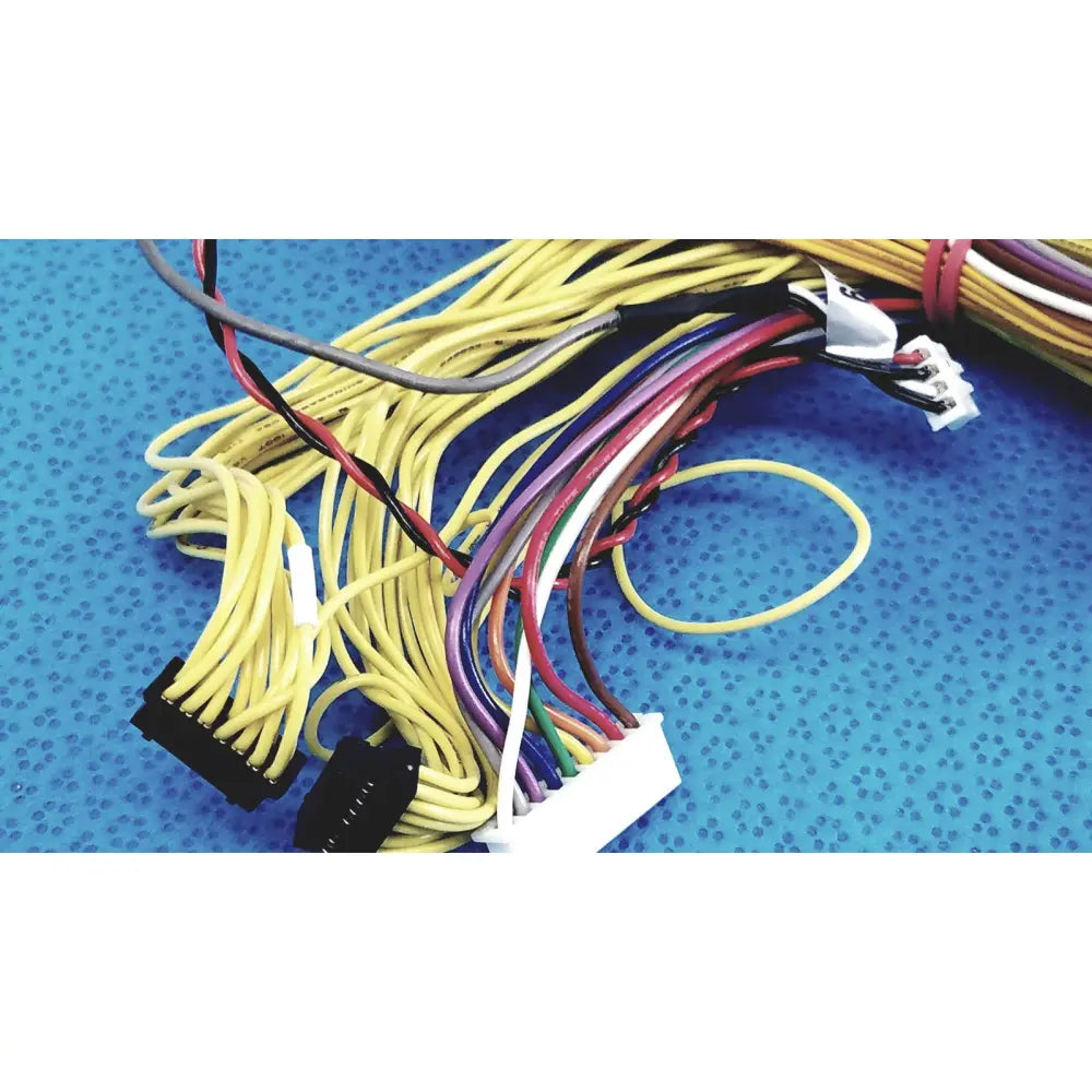 A tangle of multicolored shinagawa awm 1007 female connectors wire harness with black and white connectors wire ends