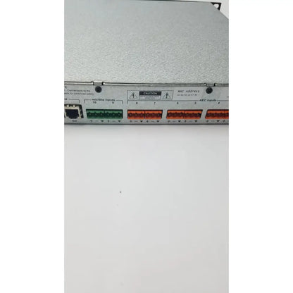 Silver metallic shure scm800 rackmount audio processing unit with green and orange modular connectors for professional use