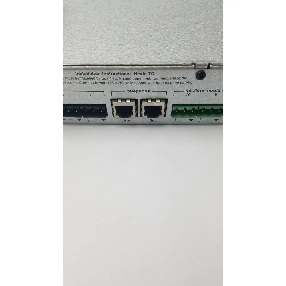 Back view of shure scm800 rackmount professional microphone mixer showing black and green nexia tc network interface ports labeled for telephone line set and mic inputs