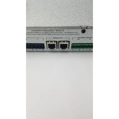 Back view of shure scm800 rackmount professional microphone mixer showing black and green nexia tc network interface ports labeled for telephone line set and mic inputs