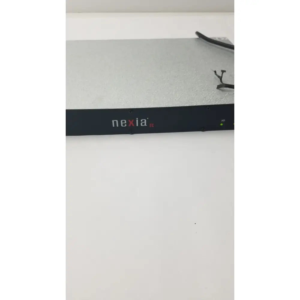 Black nexia ic network equipment with matte finish and silver textured top surface in shure scm800 rackmount professional mixer