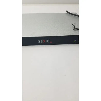 Black nexia ic network equipment with matte finish and silver textured top surface in shure scm800 rackmount professional mixer