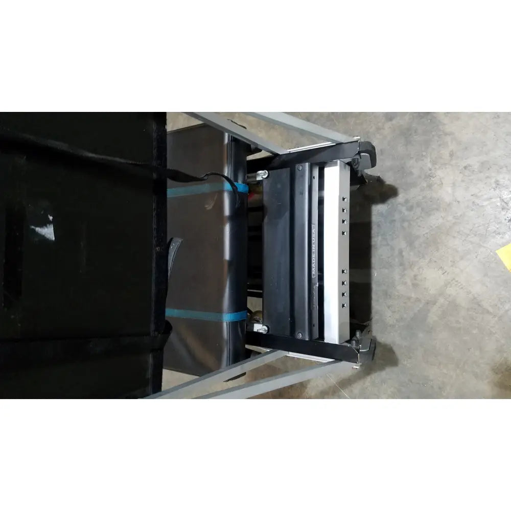 Black and silver industrial-grade metal cart with adjustable shelves for shuttle recovery sport use