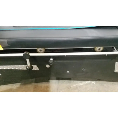 Black industrial shuttle recovery sport machine with silver metal handle and wheels for efficient recovery sport use