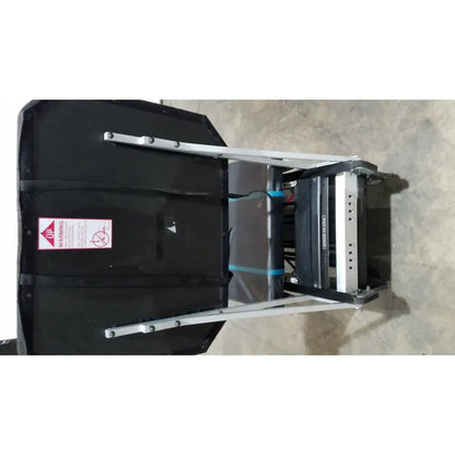 Black padded flight case with silver metal frame blue straps and warning label for shuttle recovery sport product