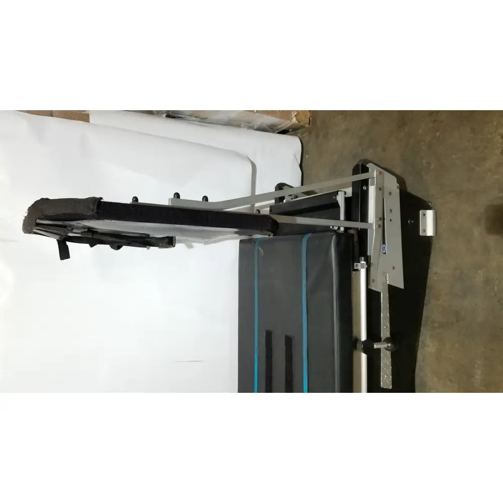 Black and silver adjustable exercise bench with blue accent stripes for shuttle recovery sport workouts and recovery sport use