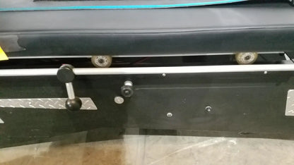 Black industrial shuttle recovery sport machine with silver metal handle and wheels for efficient recovery sport use