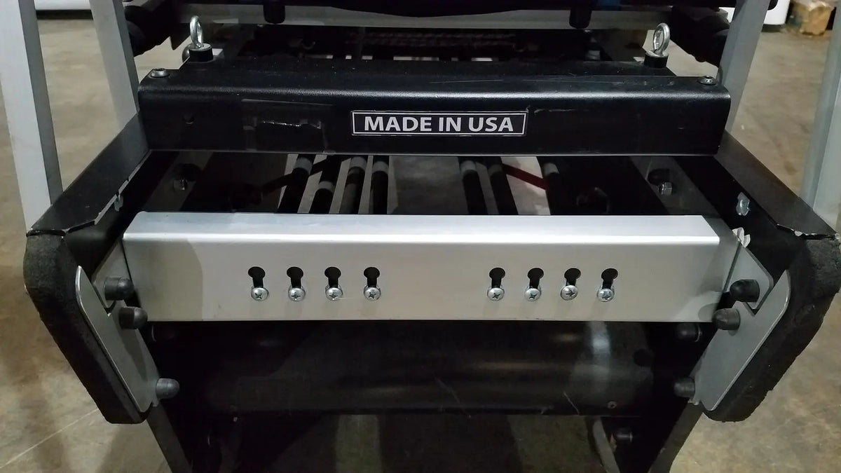 Black and silver industrial-grade Shuttle Recovery Sport machine with multiple keyholes and made in USA label on front panel