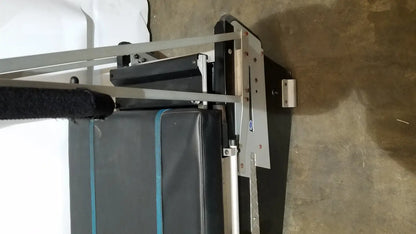 Gray and black weight bench with blue trim designed for shuttle recovery sport and recovery sport training use