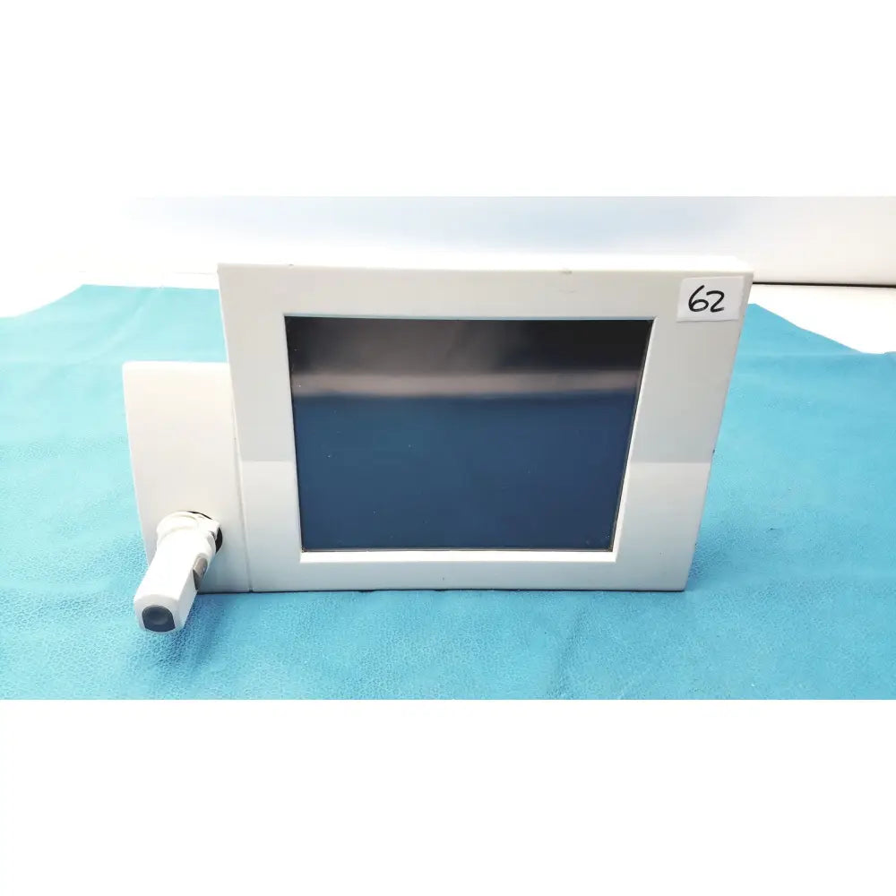 Siemens 07558831 ipx4 control console featuring a white rectangular medical monitor with dark blue screen and attached camera